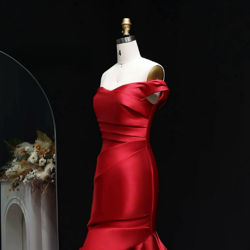 Woman wearing the Old Money Collection Couture Zuinn Gown