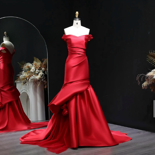 Woman wearing the Old Money Collection Couture Zuinn Gown