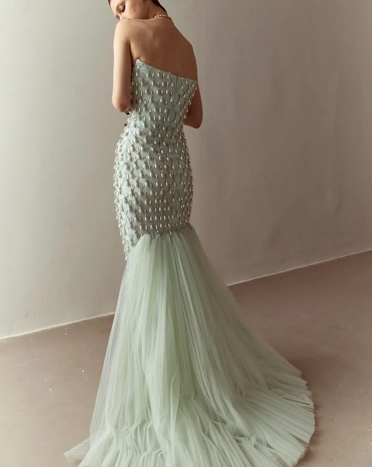 Woman wearing the Old Money Collection Traniva Gow