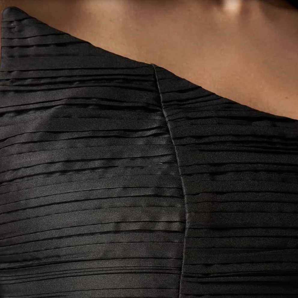 Woman wearing The Old Money Collection Couture Candelaria Gown
